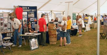 People at the Save Passamaquoddy Bay booth